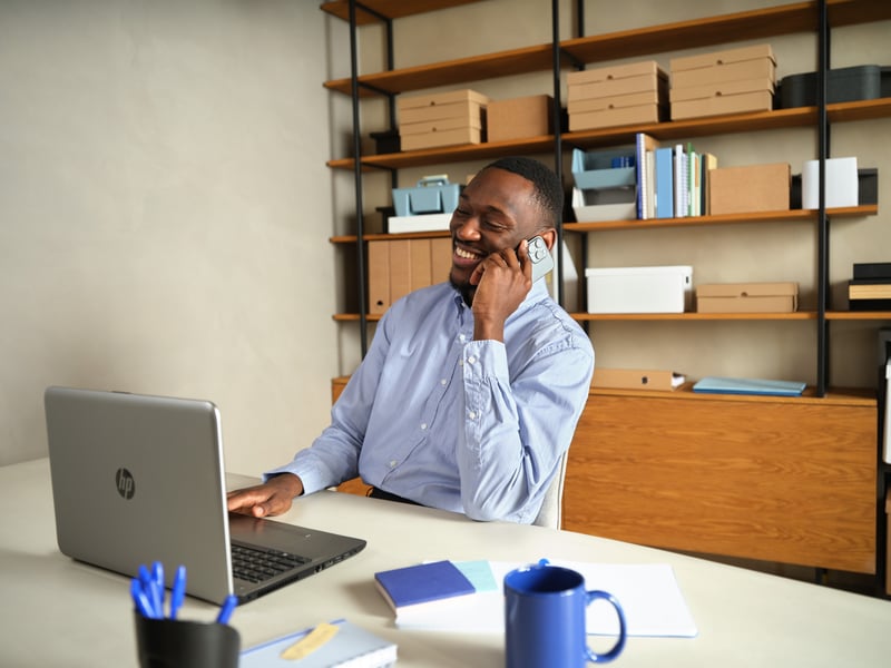 A person on the phone in an office