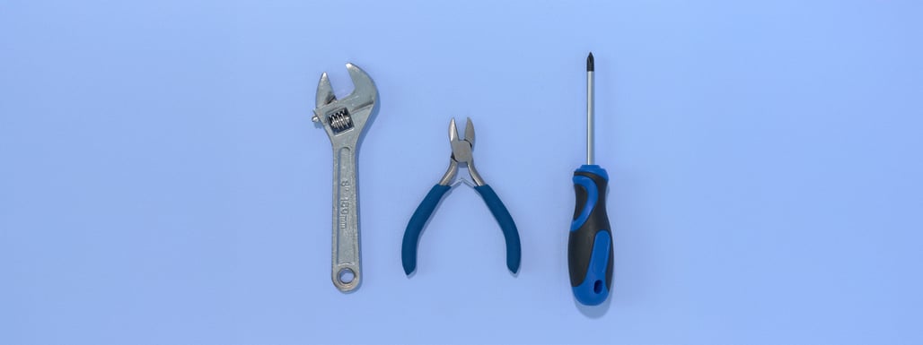 blue background with tools to use for diy